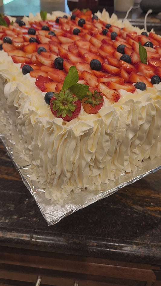 Vanilla Cake with Whip Cream and Fresh strawberries